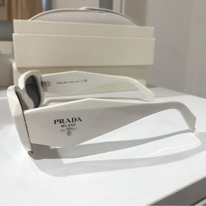 Prada SPR 17W white sunglasses